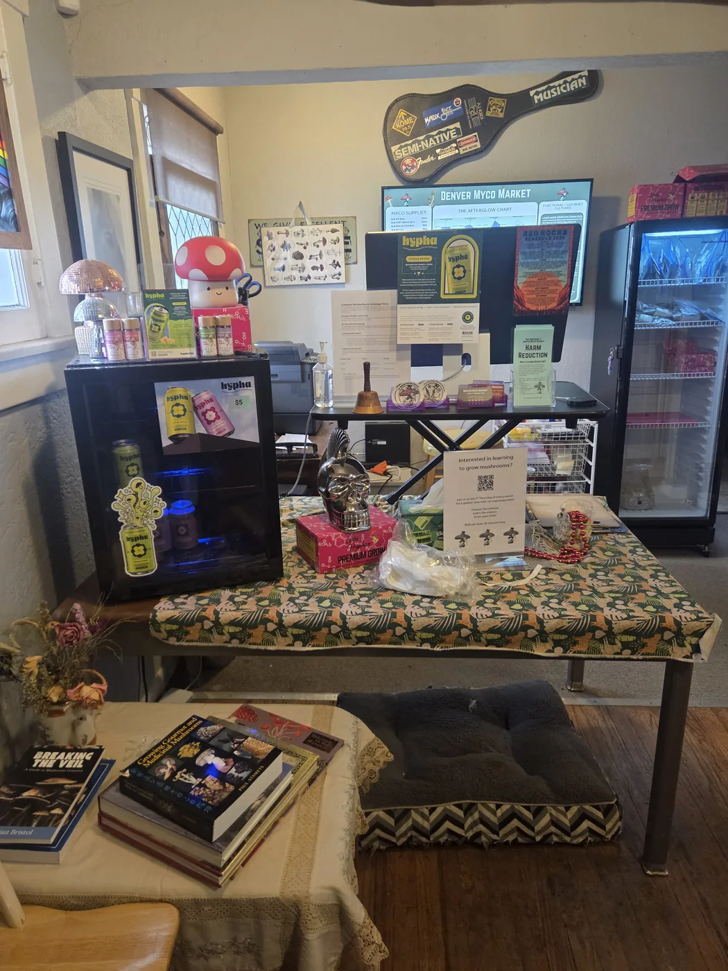 Counter and shelves inside Denver Myco Market